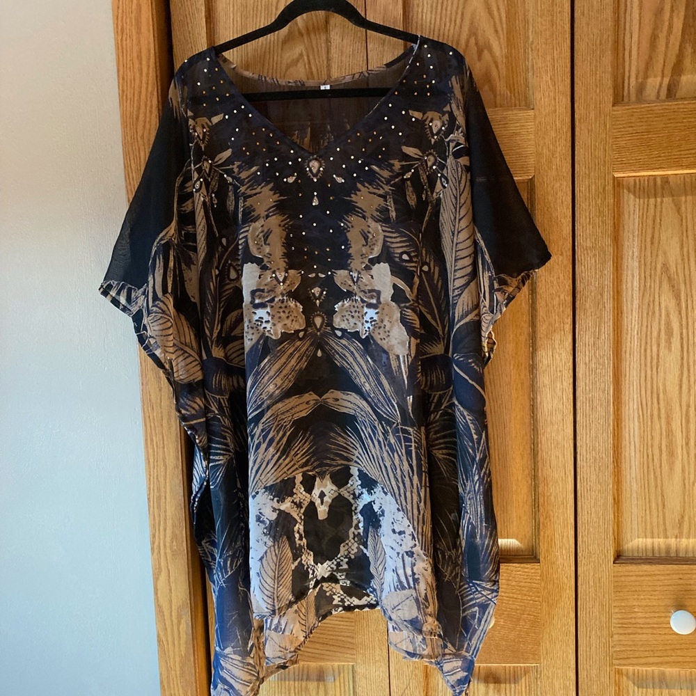 Sheer swimsuit coverup.